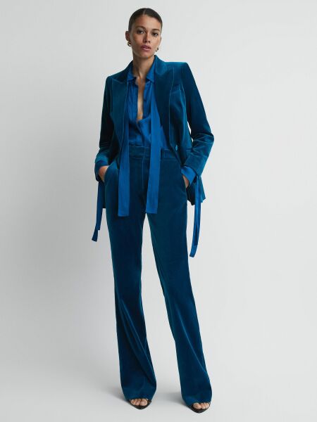 Can I wear a trouser suit to a high end wedding?