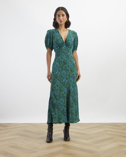 Looking for a colourful structured wedding dress that still feels bridal
