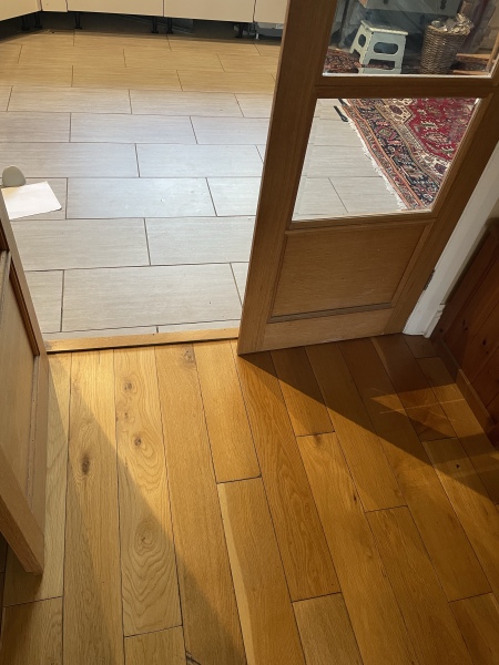 Flooring ideas to complement existing wood in a knock through room b