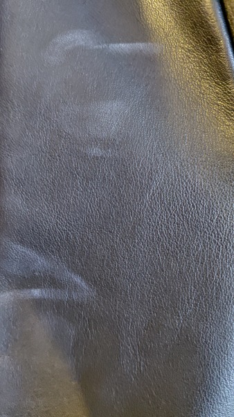 White marks on new leather jacket - help!
