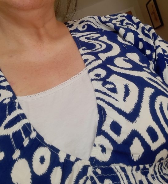 I’ve got this ladybird dress, and the neckline is so low, what would you team it with ?