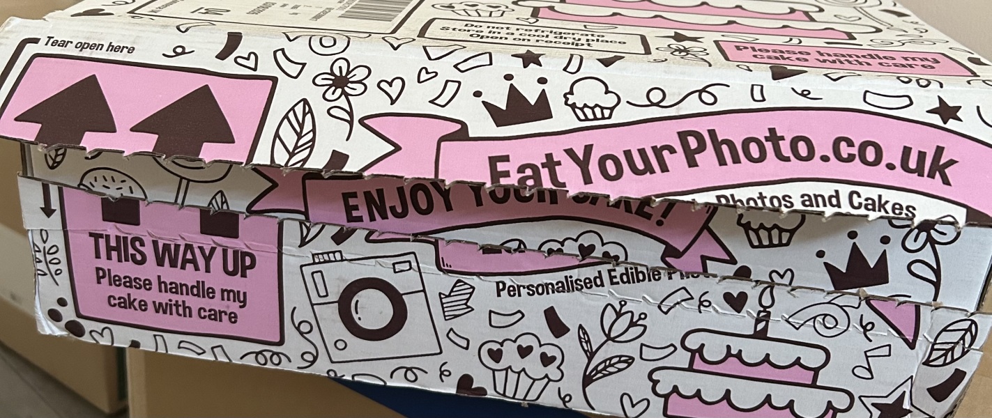 AIBU to worry about eating a photo cake left in an open box?