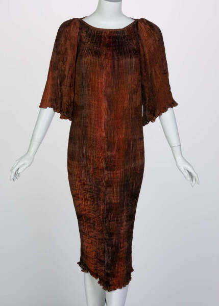 What could I wear over a Fortuny style dress for a wedding?