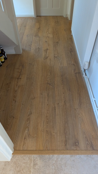 Quickstep laminate impressive herringbone or ivory oak straight plank