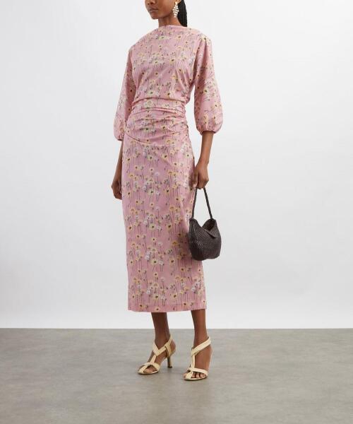Husband dislikes my mother of the bride dress choices, am I wrong?