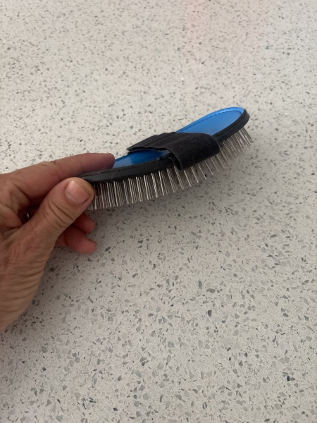 Brush recommendations for a Tibetan terrier who dislikes grooming