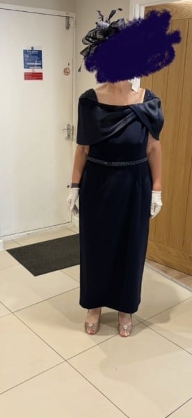 Husband dislikes my mother of the bride dress choices, am I wrong?