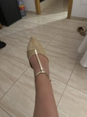 Someone bought lovely green / gold shoes for a wedding