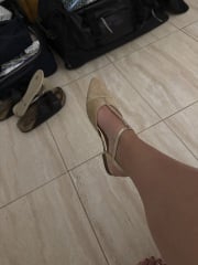 Someone bought lovely green / gold shoes for a wedding