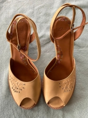 What colour shoes would work best with a cornflower blue dress?