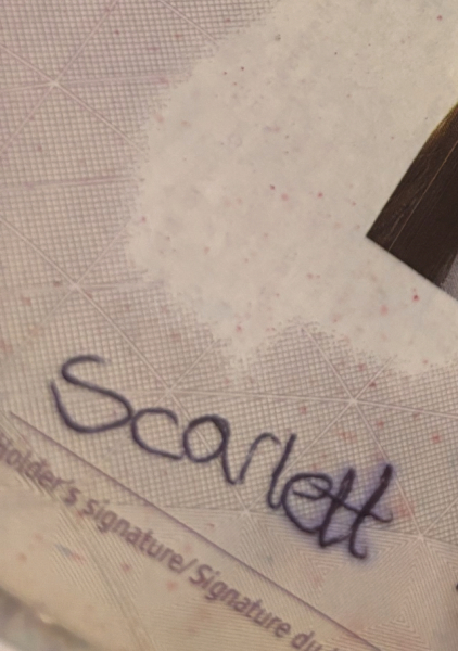 Husband has smudged signature on new passport