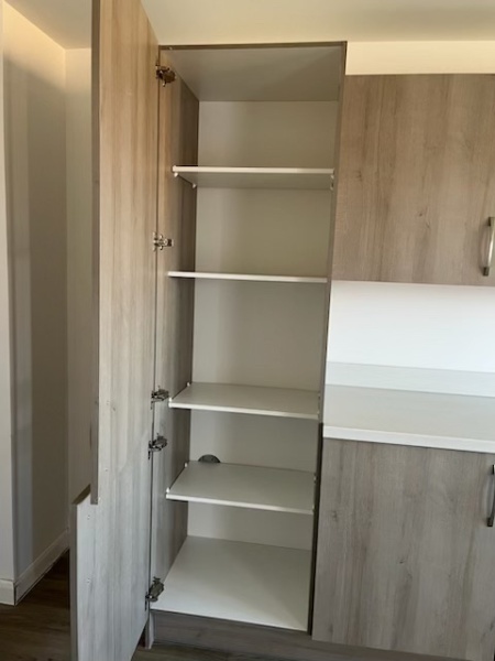 Can this fitted cupboard be adapted for an integrated fridge freezer?