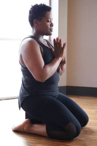 How can I improve comfort in cross legged yoga positions?