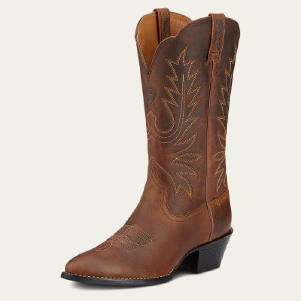 Are Western boots suitable for English style riding on a horse holiday?