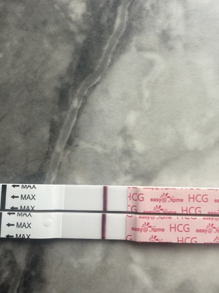 Does anyone else see a faint second line at 11DPO?