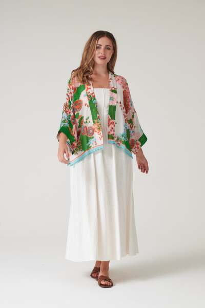 What jacket or cover-up would suit this dress for a daytime wedding?