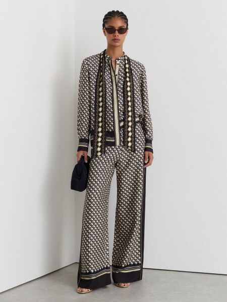 Black tie alternatives to dresses for a stylish November birthday bash
