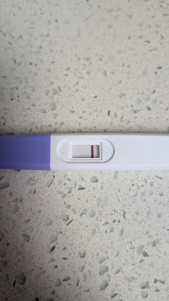 Possible positive test at 12 DPO or just an indent?
