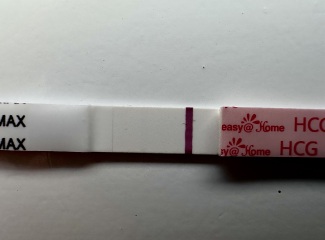 Could these faint pregnancy test lines be indents or a faulty batch?