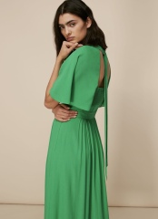 What jacket or cover-up would suit this dress for a daytime wedding?