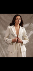 What could I wear over a Fortuny style dress for a wedding?