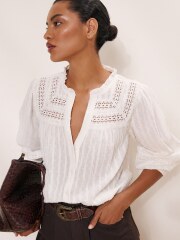 Where can I find an ivory broderie anglaise blouse for jeans?