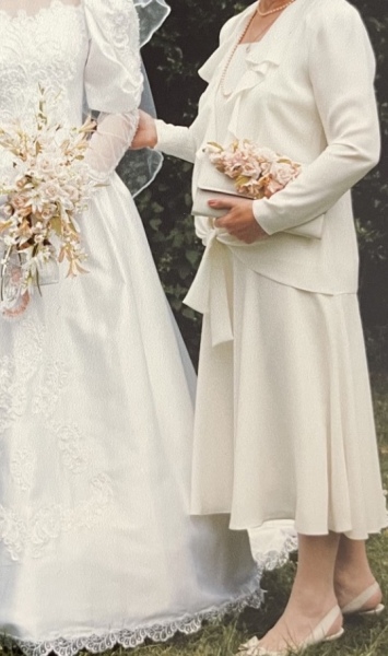 Mother of groom wearing cream?