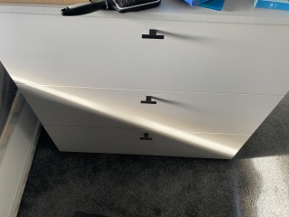 How can I remove a mark from a chest of drawers?