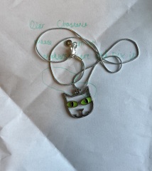 Can anyone identify my lost cat pendant necklace - gift from my child from a charity shop?